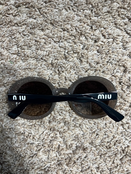 Miu Miu Glossy Round Sunglasses in Taupe and Black